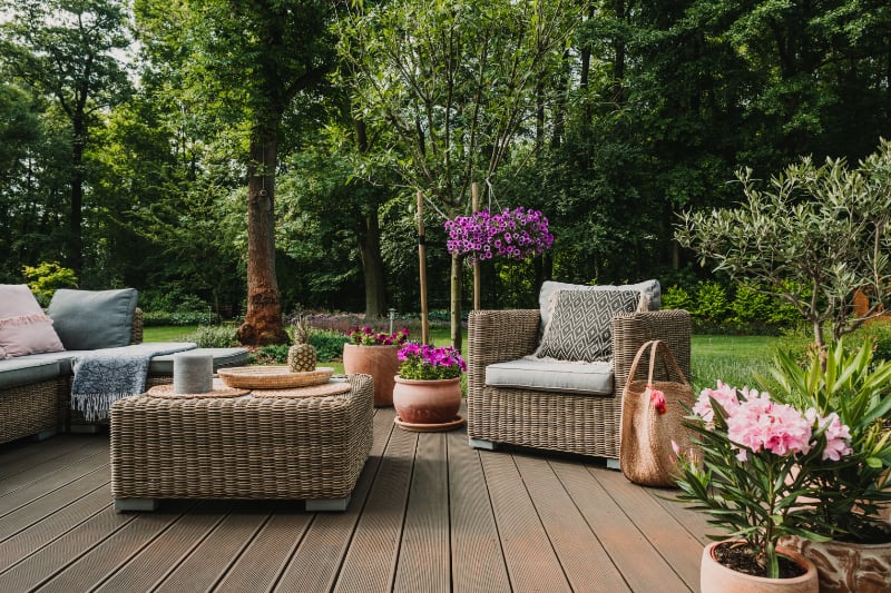 elegant garden furniture on terrace of suburban ho 2021 08 26 15 45 47 utc